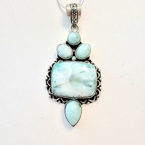 Gorgeous, 2 inch, 5 stone, 925 marked, Larimar pendant on a silver chain.